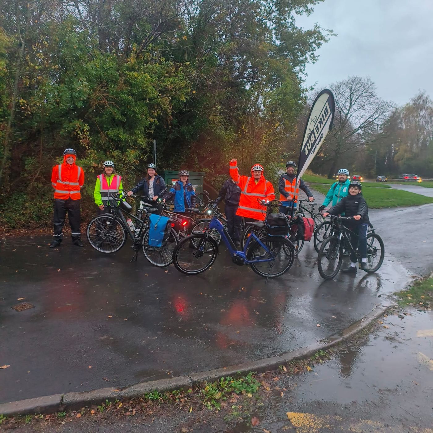 Marshals in hi-vis and families with bikes at the first Droitwich Bike Bus, 7 November 2025